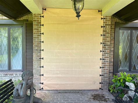 hurricane metal shutters vs fabric shield|where to buy hurricane fabric.